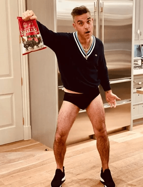 Robbie Williams critica cantores que recusaram shows na Copa do Catar 6
